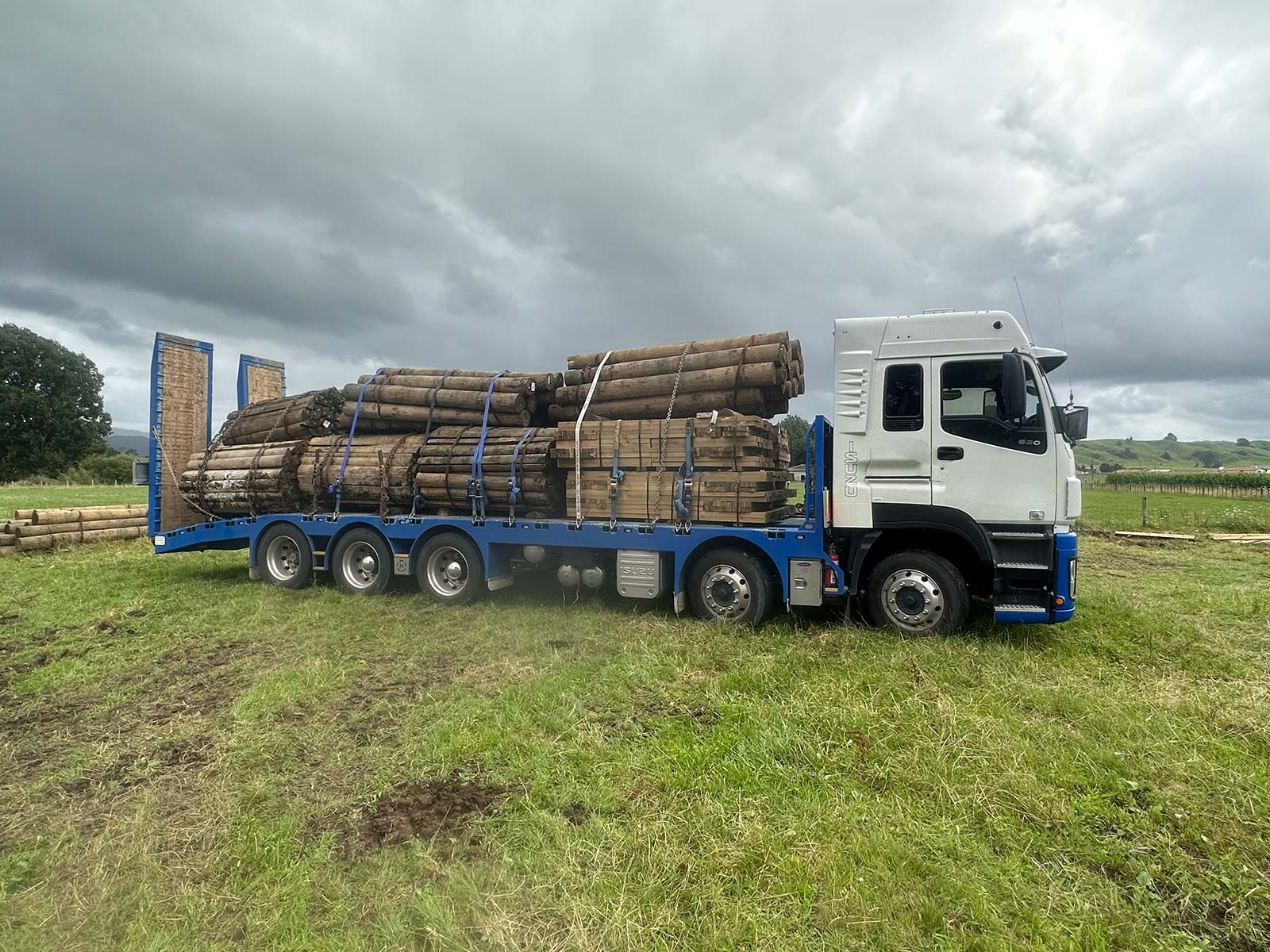 Truck making a fencing materials delivery for Madden Fencing contractors